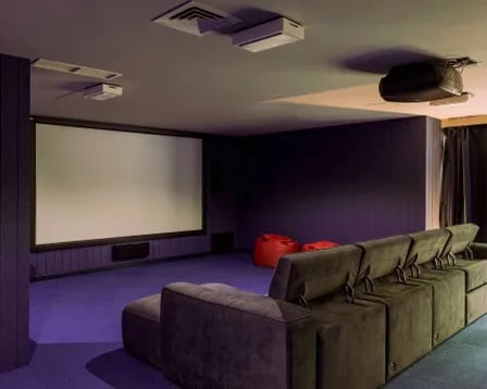 Cinema seating beanbags projector screen cinema at Scape Wembley in London Student Accommodation