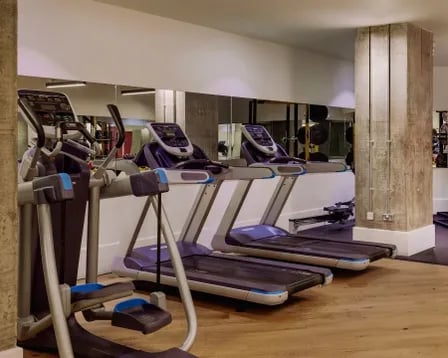 Elliptical trainer and treadmills fitness area at Scape Wembley in London Student Accommodation
