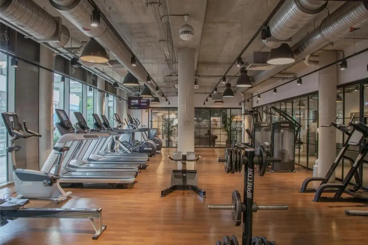 Treadmills weight machines rowing machine gym fitness area at Chapter Lewisham in London Student Accommodation
