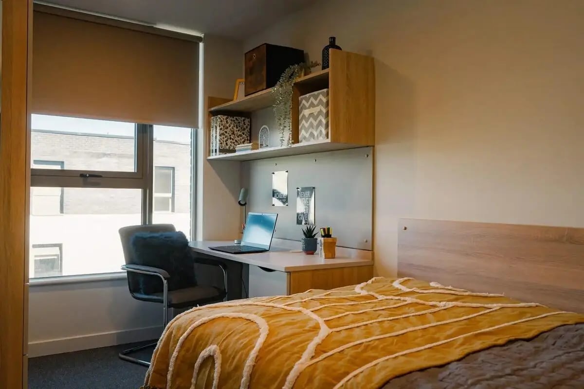 Bed desk chair laptop shelves bedroom at Redgate in Nottingham Student Accommodation