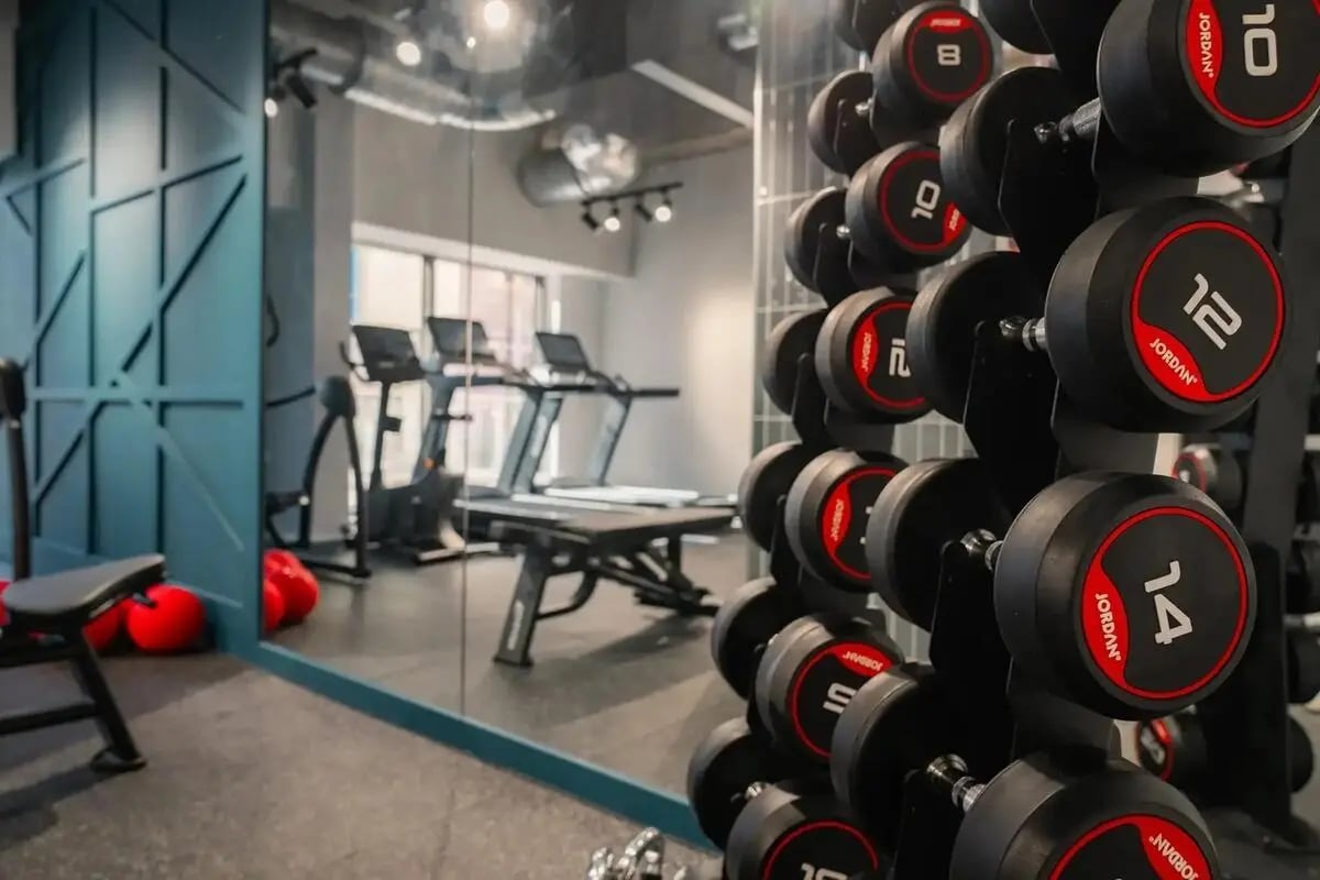 Dumbbells treadmills and workout bench gym at Redgate in Nottingham Student Accommodation