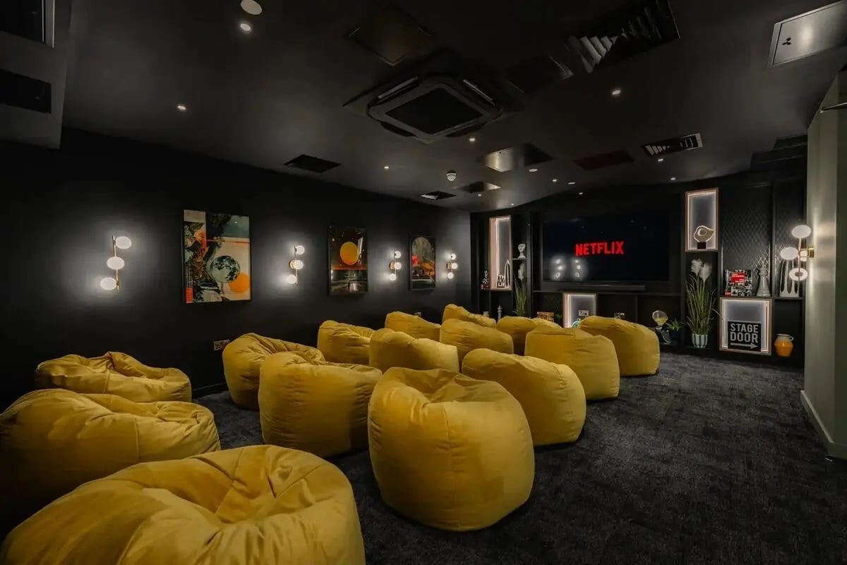 Yellow beanbags before Netflix screen cinema room at Redgate in Nottingham Student Accommodation