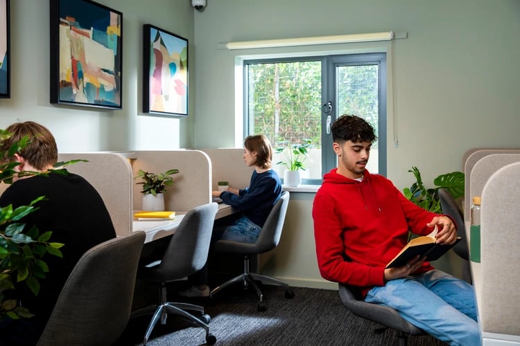 Students study at desks with art study area at Student Living Heights in London Student Accommodation