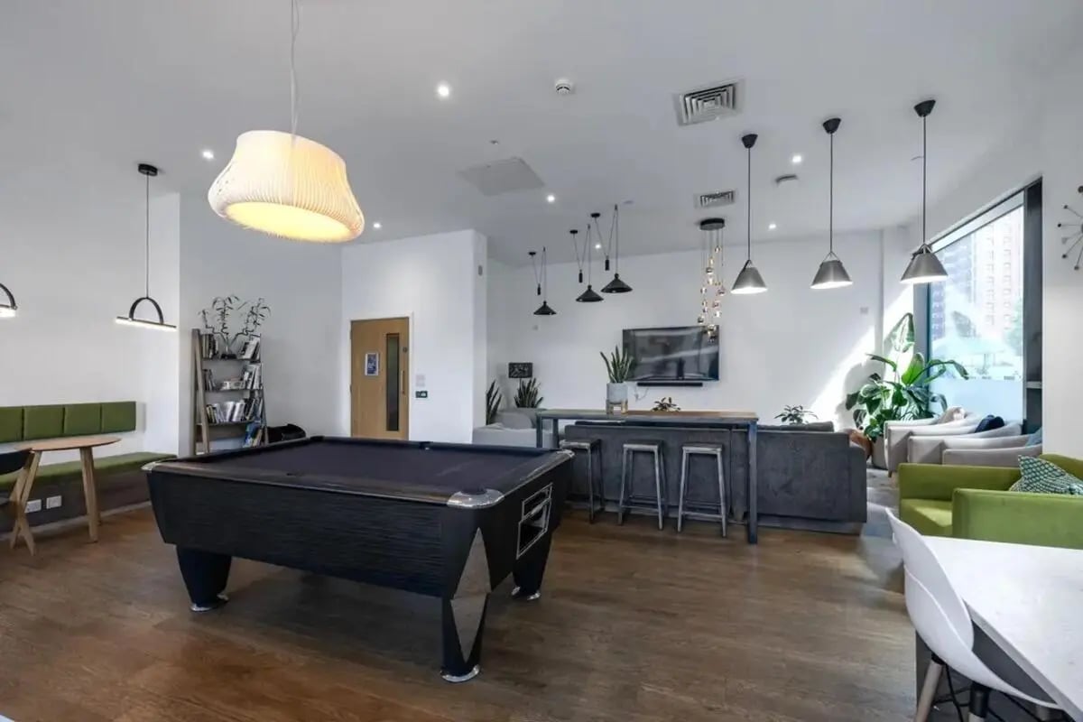 Pool table bar lounge area with seating Living room at Wembley Barnard Point in London Student Accommodation