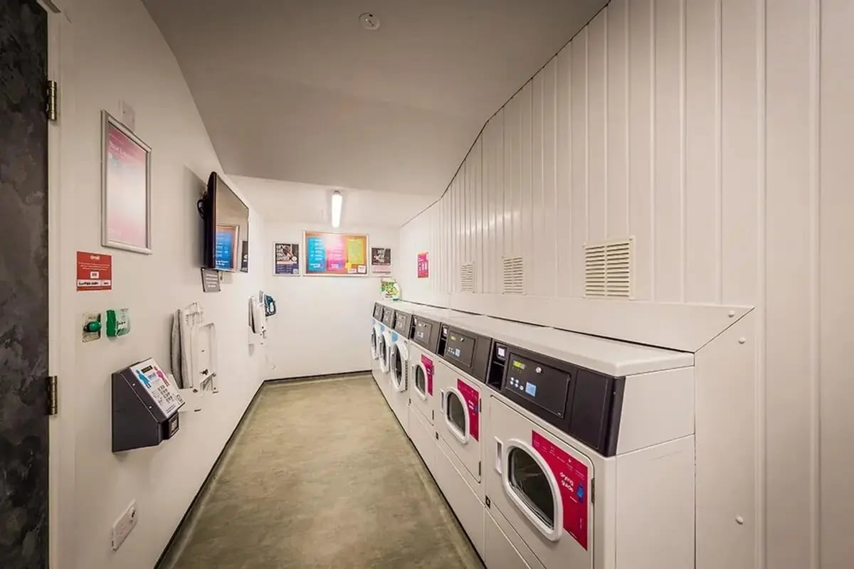 Washing machines and dryers laundry room at Chapter Westminster in London Student Accommodation