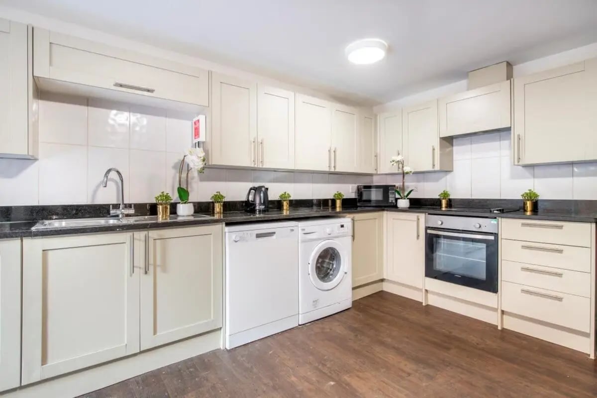 Kitchen cabinets sink dishwasher oven microwave kitchen at 4 Rob Roy House in Nottingham Student Accommodation