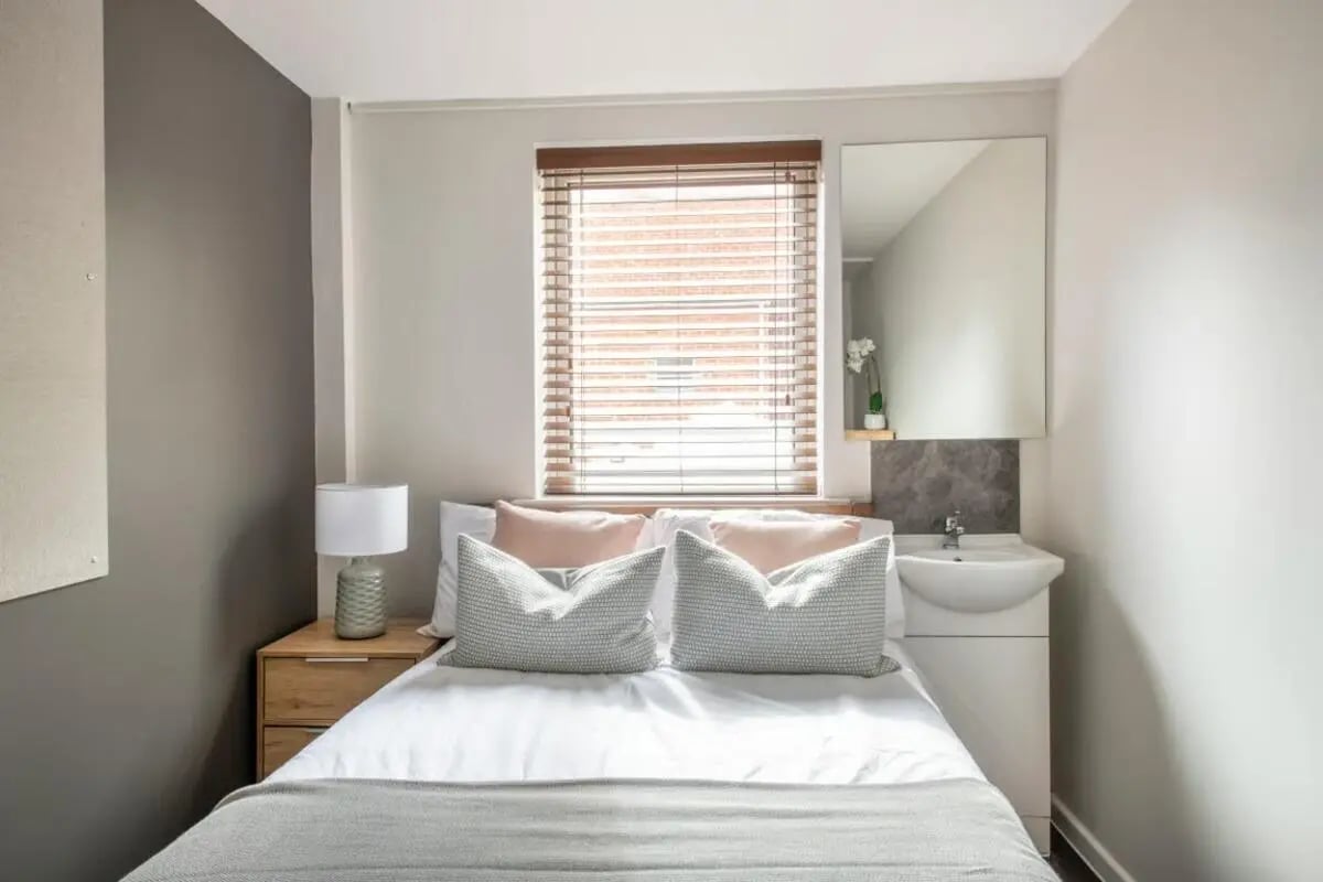 Bed with sink and mirror bedroom at 4 Rob Roy House in Nottingham Student Accommodation