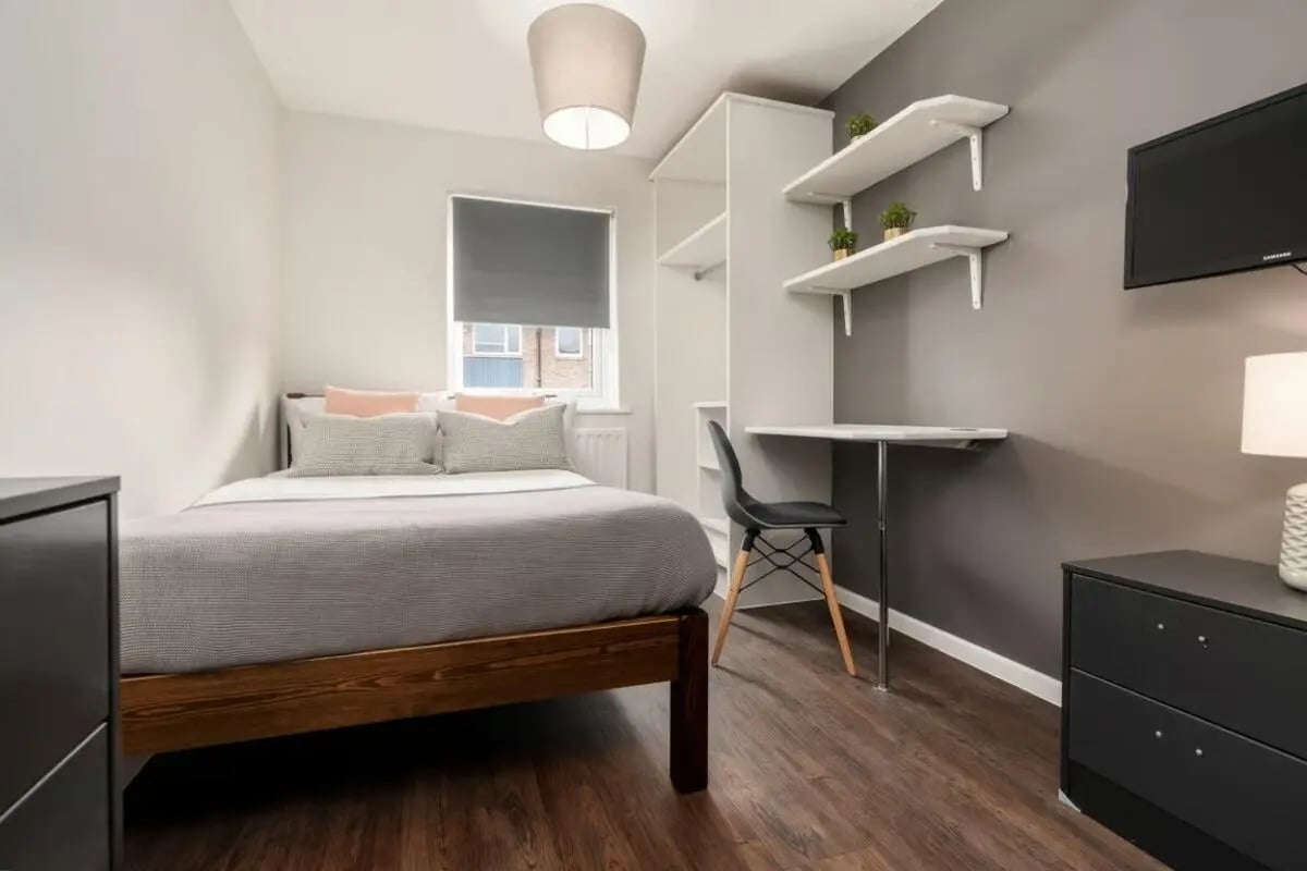 Bed desk shelves chair dresser bedroom at 28 Church Street in Nottingham Student Accommodation