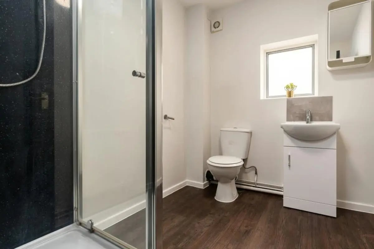 Shower toilet sink and cabinet bathroom at 28 Church Street in Nottingham Student Accommodation