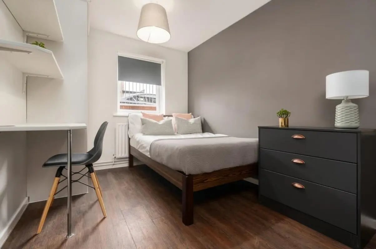 Bed desk chair dresser with lamp bedroom at 28 Church Street in Nottingham Student Accommodation