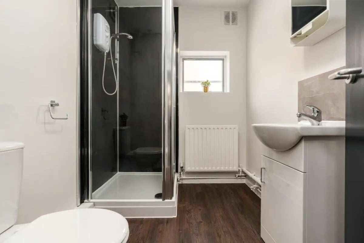 Shower toilet sink and radiator bathroom at 28 Church Street in Nottingham Student Accommodation