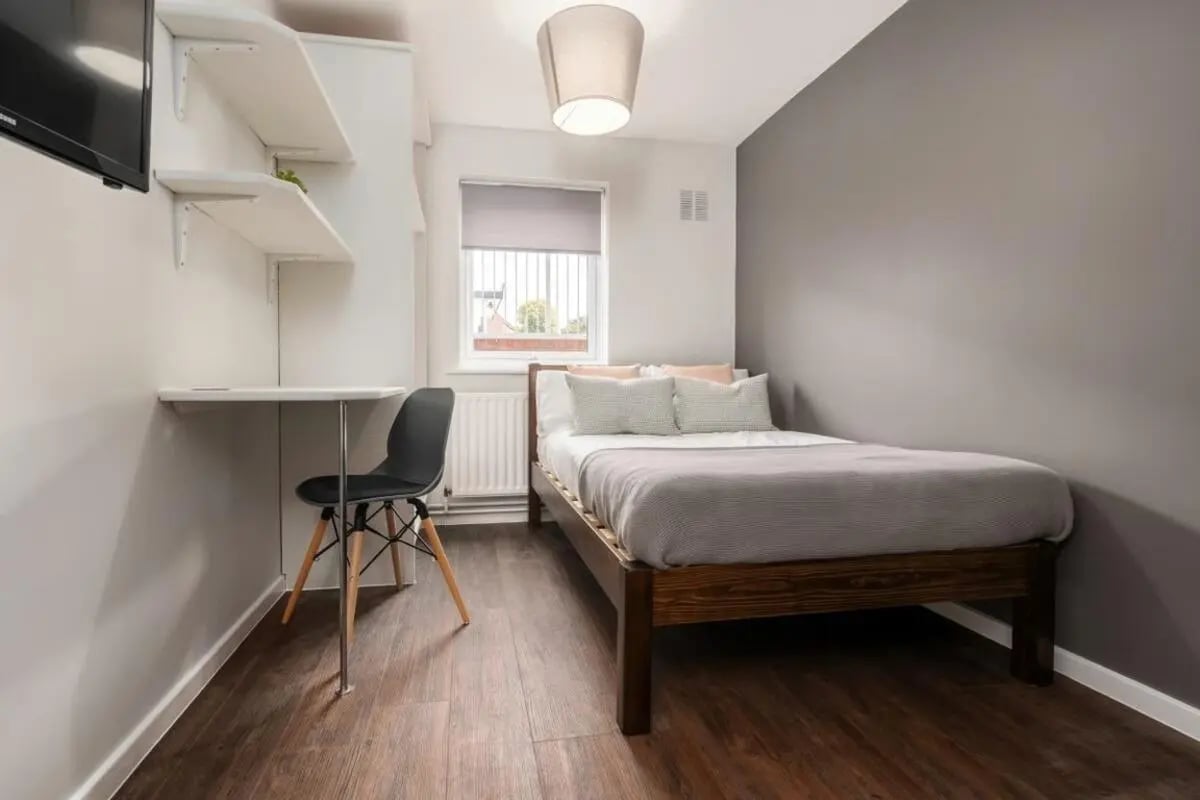 Bed desk chair shelves bedroom at 28 Church Street in Nottingham Student Accommodation