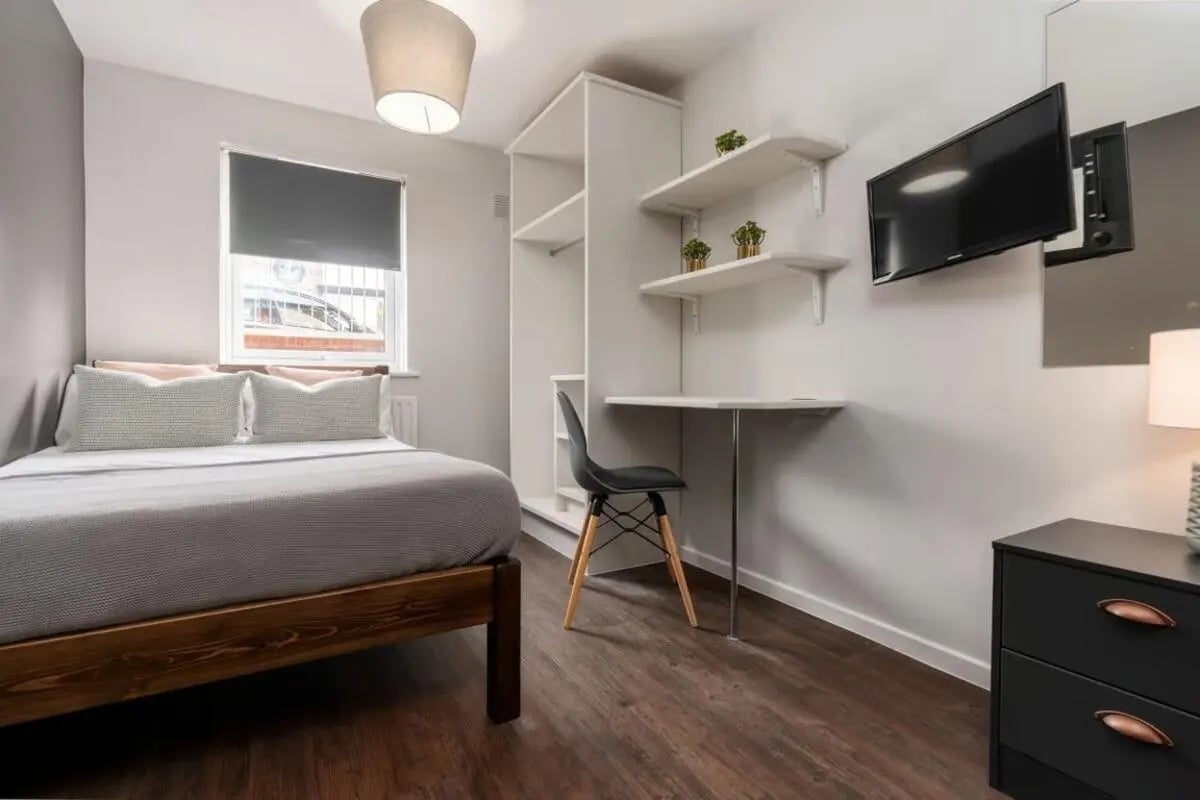 Bed desk shelving TV dresser bedroom at 28 Church Street in Nottingham Student Accommodation