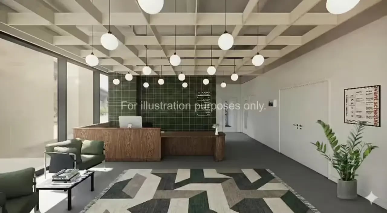 Reception area with lounge seating and desk living room at City Wharf in Glasgow Student Accommodation