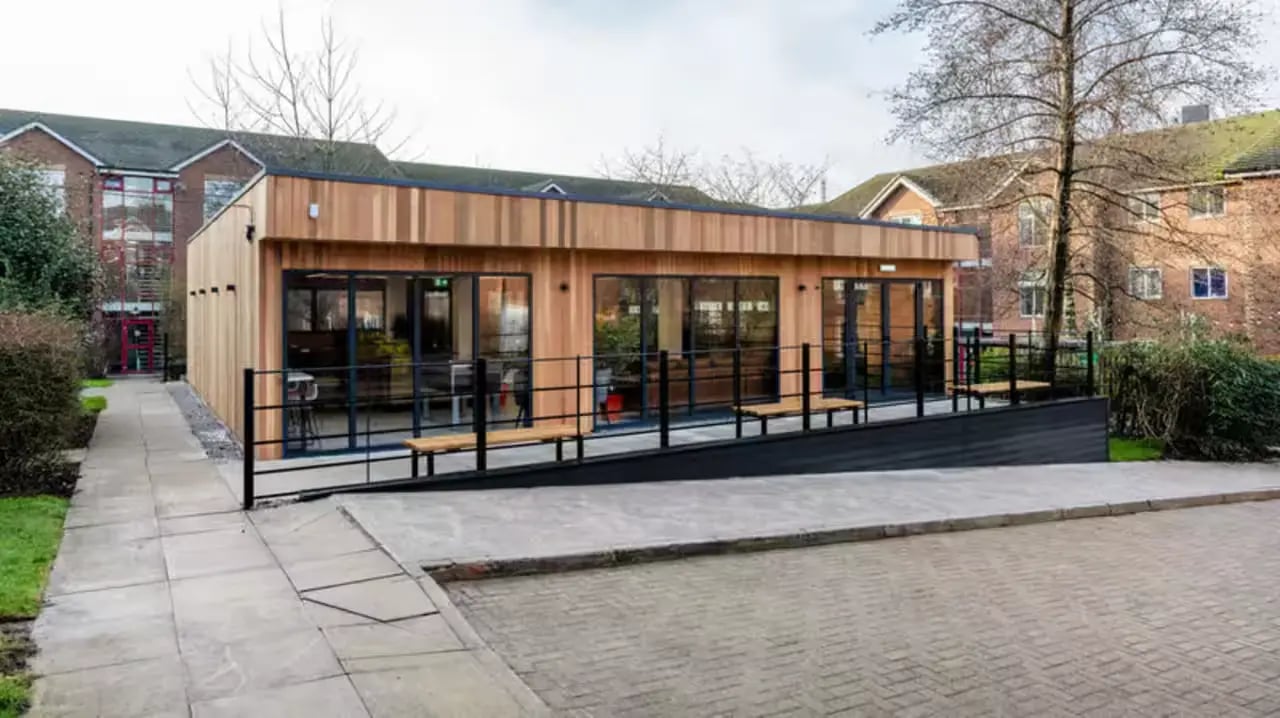 Wooden building with glass doors exterior at Paddington Park House in Liverpool Student Accommodation