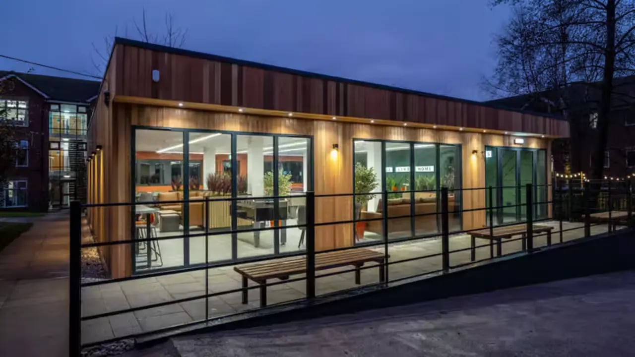 Wooden exterior building with modern windows lounge exterior at Paddington Park House in Liverpool Student Accommodation