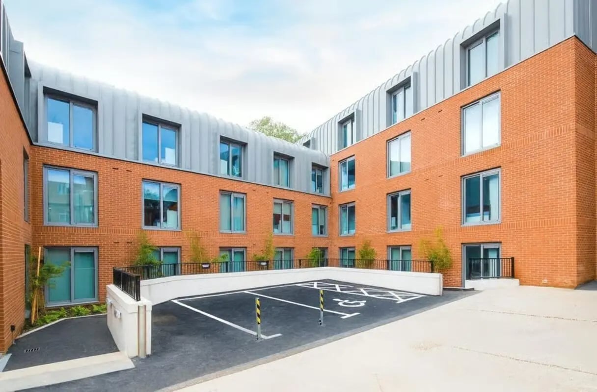 Building with parking and disabled bay exterior at The Cube Ealing in London Student Accommodation