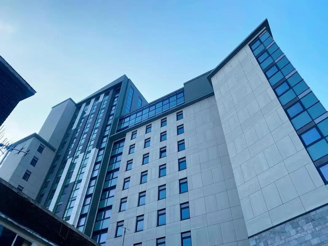 Modern student accommodation building with many windows exterior at Saltwater Place in Plymouth Student Accommodation