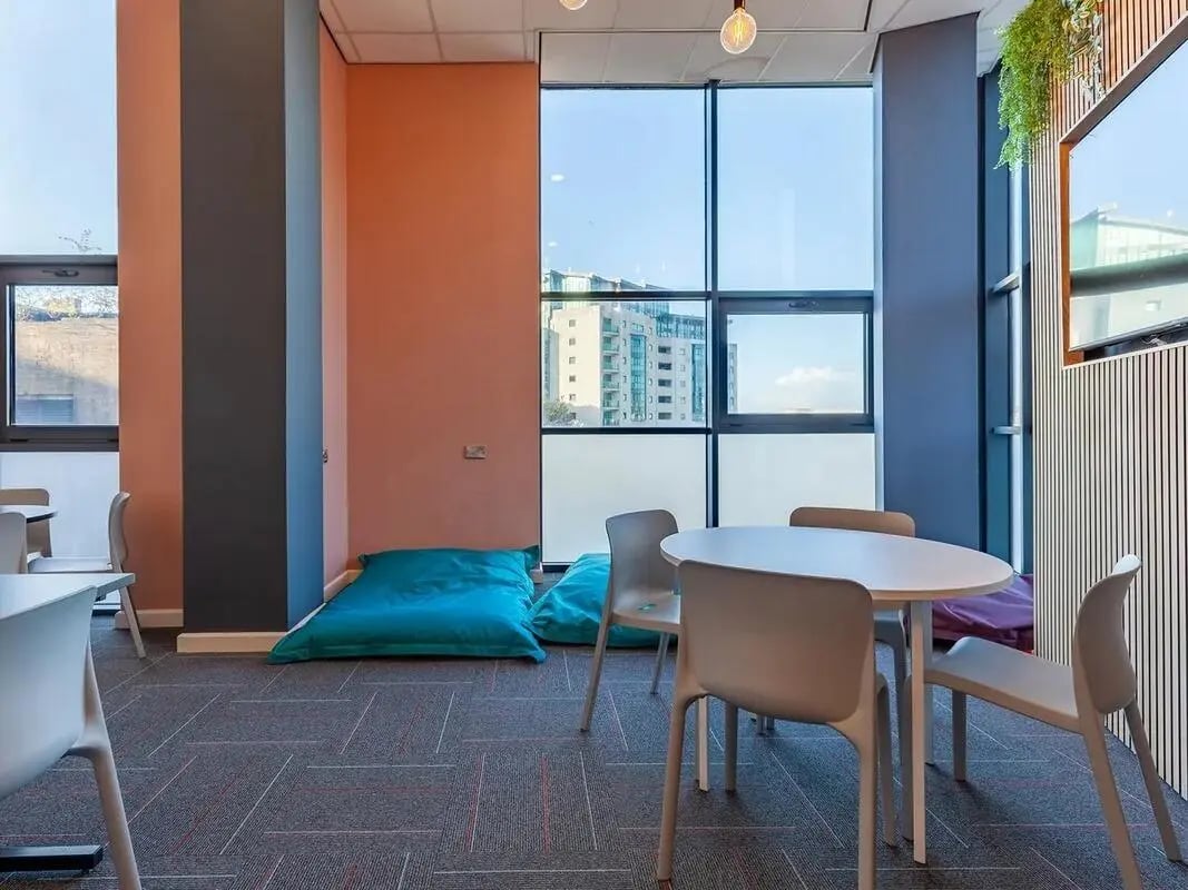 Beanbags chairs and oval table communal living room at Saltwater Place in Plymouth Student Accommodation