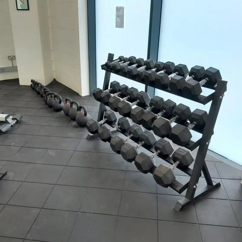 Dumbbell rack and kettlebells in gym area at Saltwater Place in Plymouth Student Accommodation