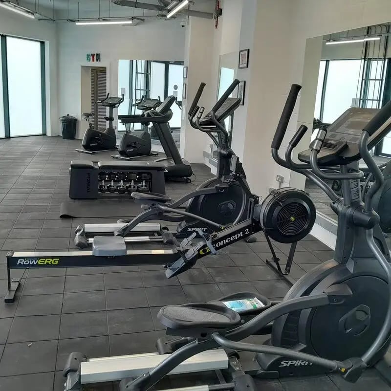 Ellipticals rowers and weight bench gym at Saltwater Place in Plymouth Student Accommodation