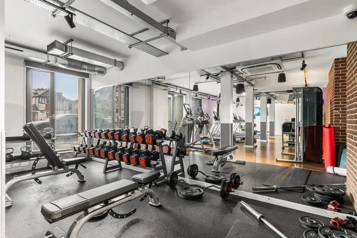 Dumbbells treadmills weight benches gym. at Chapter White City in London Student Accommodation