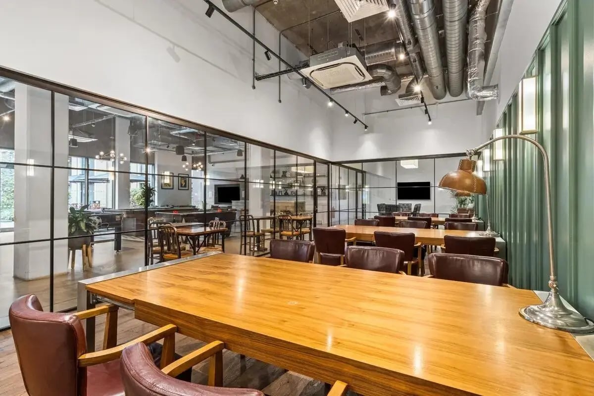 Tables with chairs modern study area at Chapter White City in London Student Accommodation