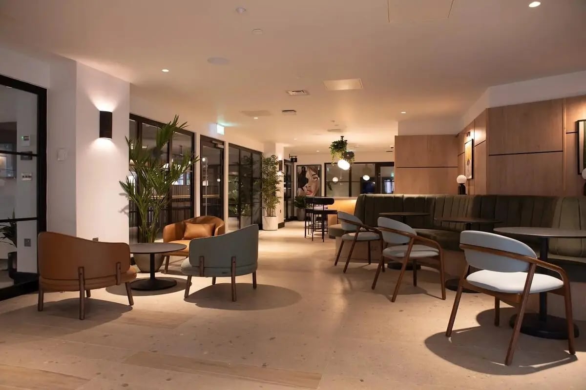 Modern seating area with tables and chairs living room at Centre Court in Nottingham Student Accommodation