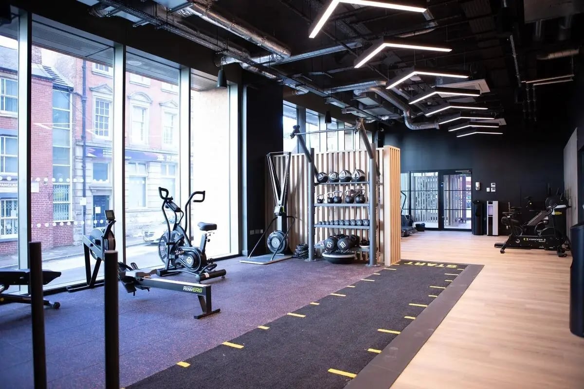 Gym equipment weights rack and running track fitness room at Centre Court in Nottingham Student Accommodation