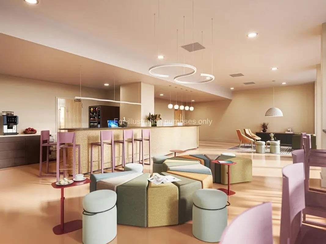Bar stools vending machine modular seating communal area at St Vincent Studios in Glasgow Student Accommodation