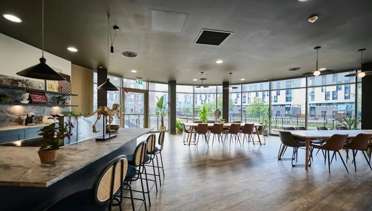 Bar with stools and dining tables common area at Deakins Place in Nottingham Student Accommodation