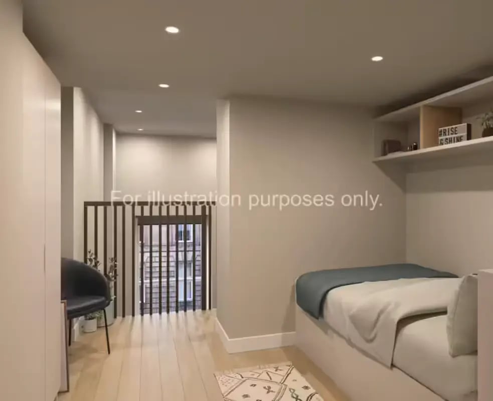 Bed with shelves chair and railing bedroom at Glasgow Citi View  in Glasgow Student Accommodation
