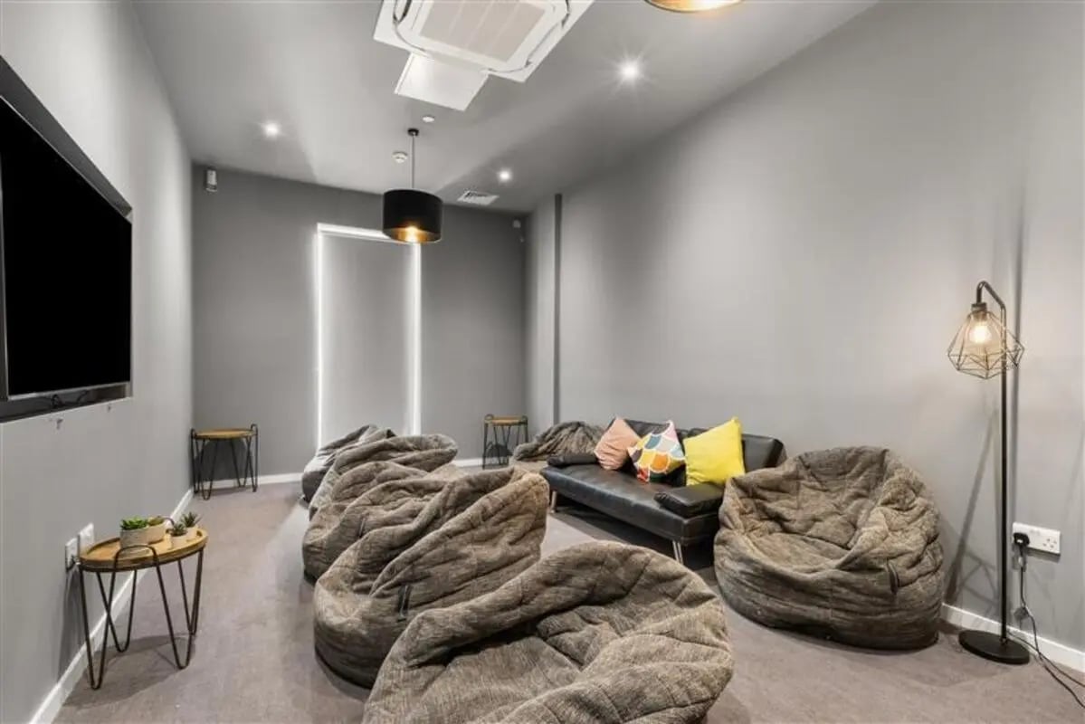 Beanbags sofa television modern lounge area at Canvas Walthamstow in London Student Accommodation