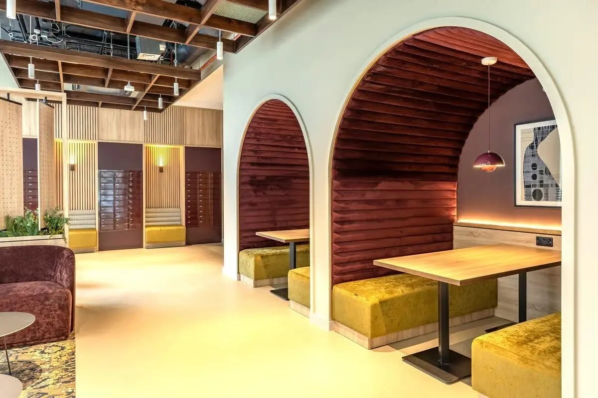 Booth seating with tables and mailboxes communal area at The Place in Nottingham Student Accommodation