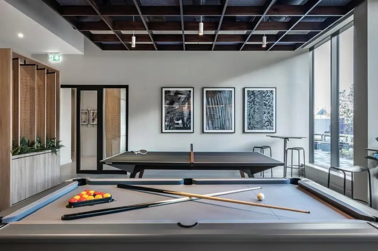 Pool table ping pong table artwork recreation room at The Place in Nottingham Student Accommodation