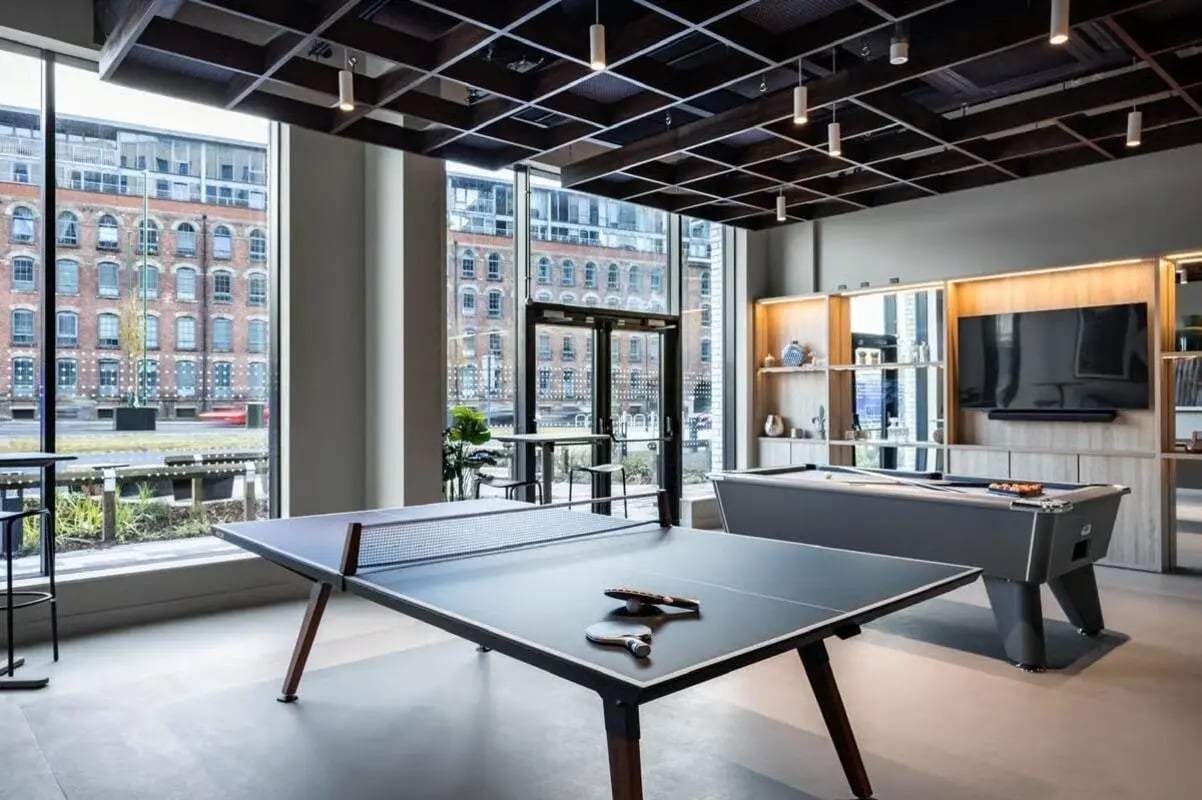 Ping pong table pool table large windows recreation area at The Place in Nottingham Student Accommodation