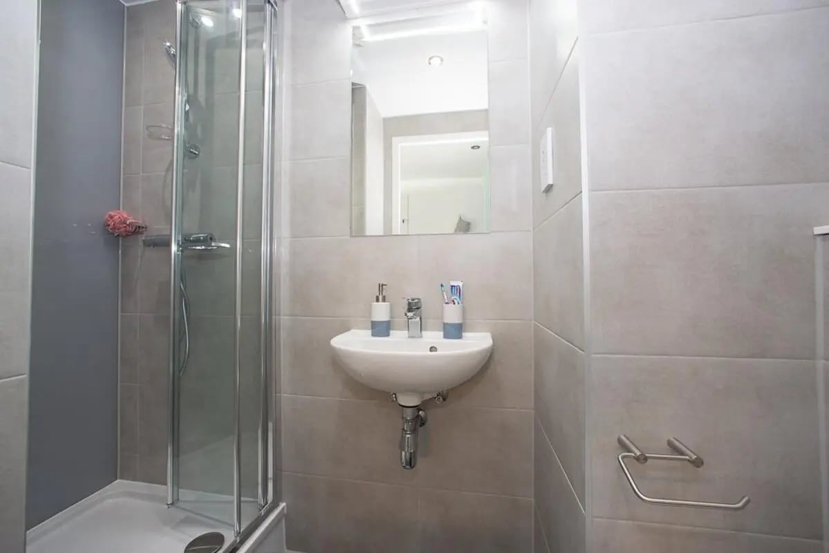 Shower sink mirror soap toothbrush holder bathroom at The Laceworks Nottingham in Nottingham Student Accommodation