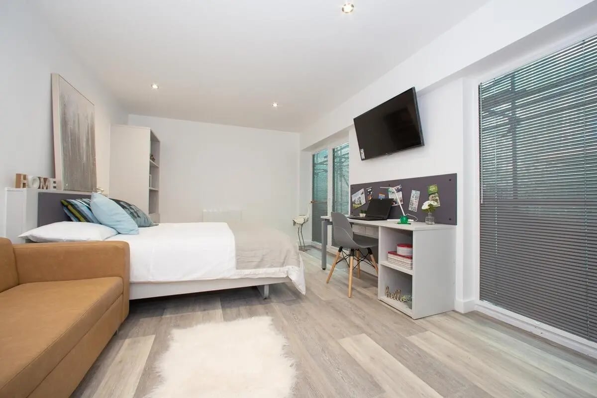Sofa bed desk TV and bookshelves studio apartment at The Laceworks Nottingham in Nottingham Student Accommodation