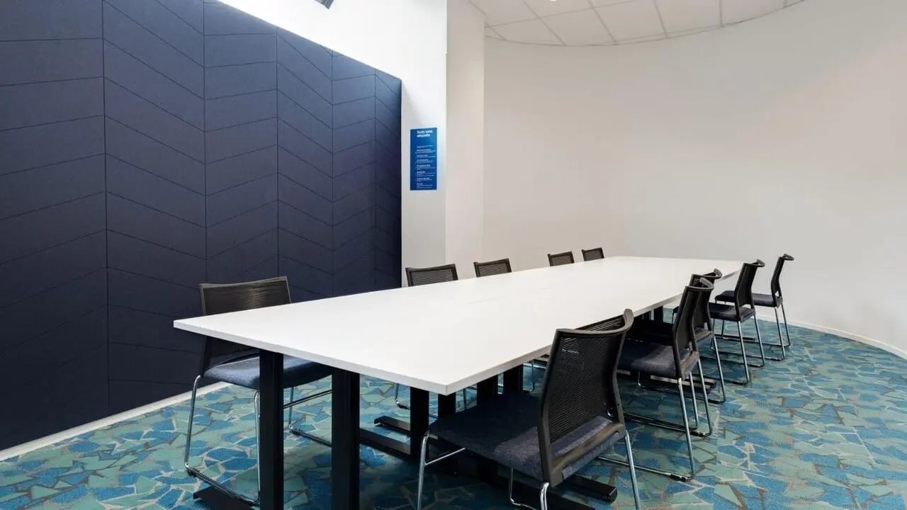 Long white table with chairs study area at UniLodge Auckland Central in Auckland Student Accommodation