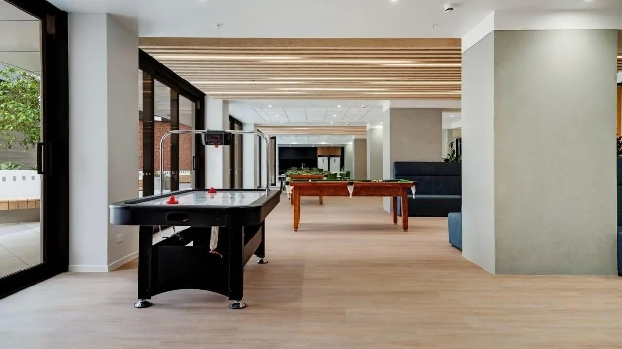 Air hockey table and pool tables common area at UniLodge Auckland Central in Auckland Student Accommodation