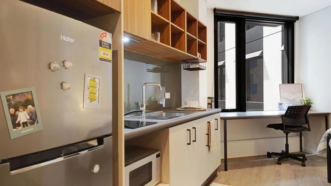 Fridge sink microwave desk chair kitchen study area at UniLodge Auckland Central in Auckland Student Accommodation