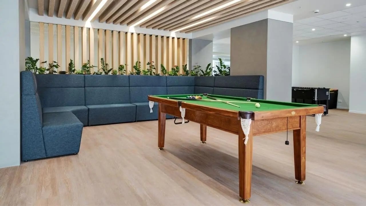 Pool table and sofa in common area at UniLodge Auckland Central in Auckland Student Accommodation