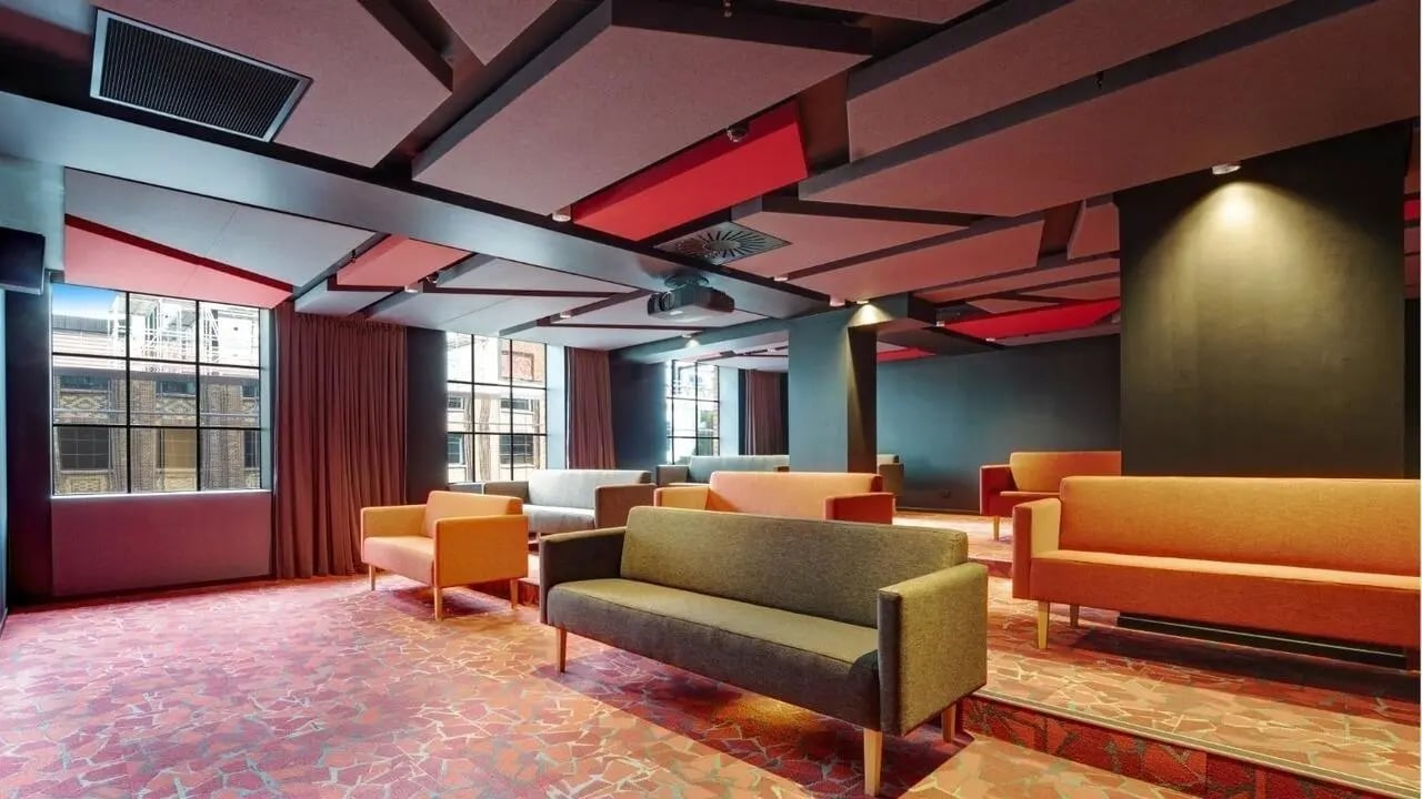 Sofas and chairs arranged in a lounge area at UniLodge Auckland Central in Auckland Student Accommodation