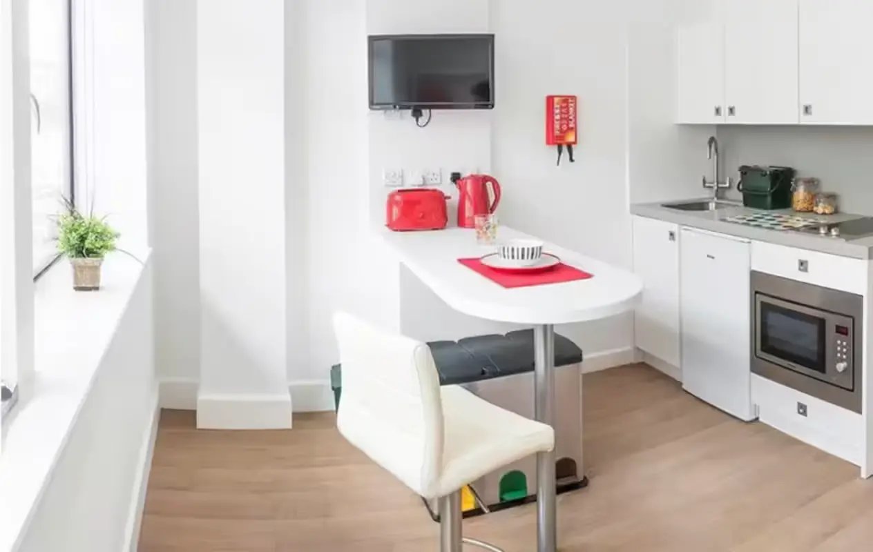 White table toaster kettle microwave kitchen area at The Colston in Bristol Student Accommodation