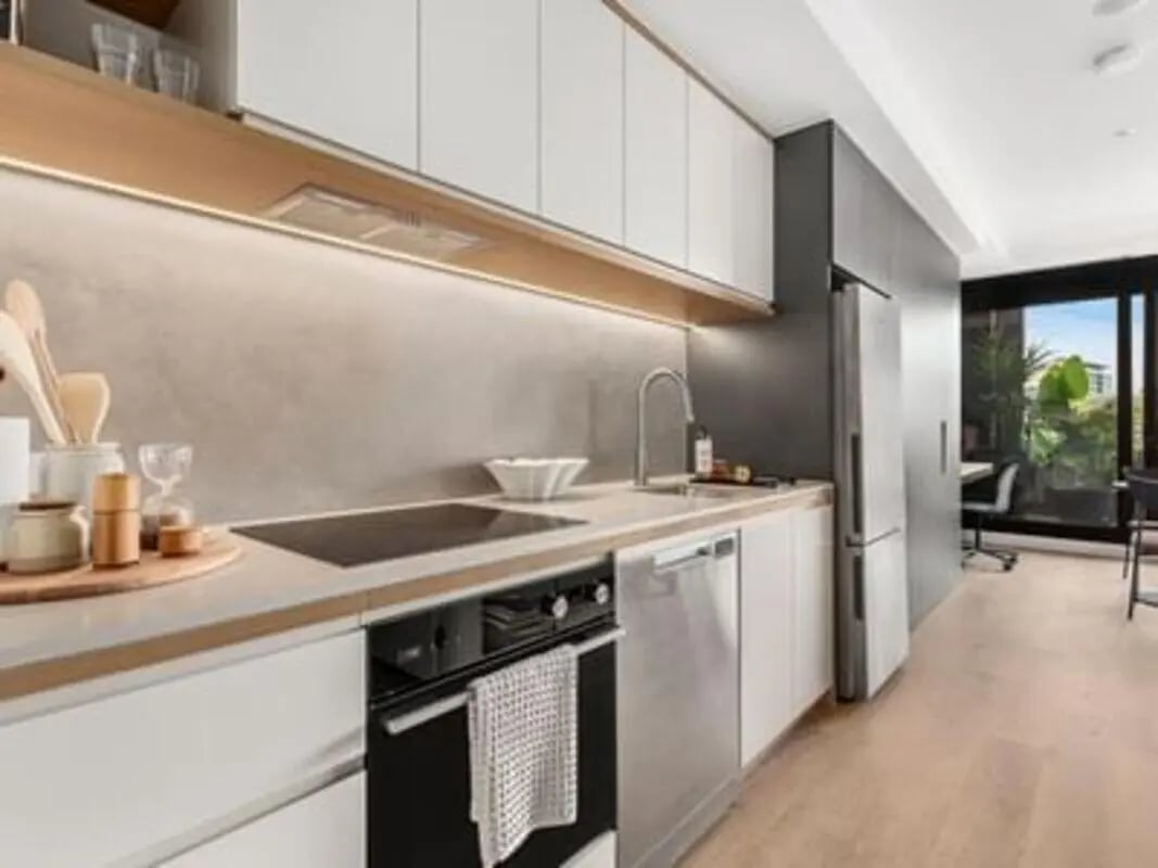 Modern kitchen with stainless steel appliances and cabinets Kitchen at Caulfield Place in Melbourne Student Accommodation