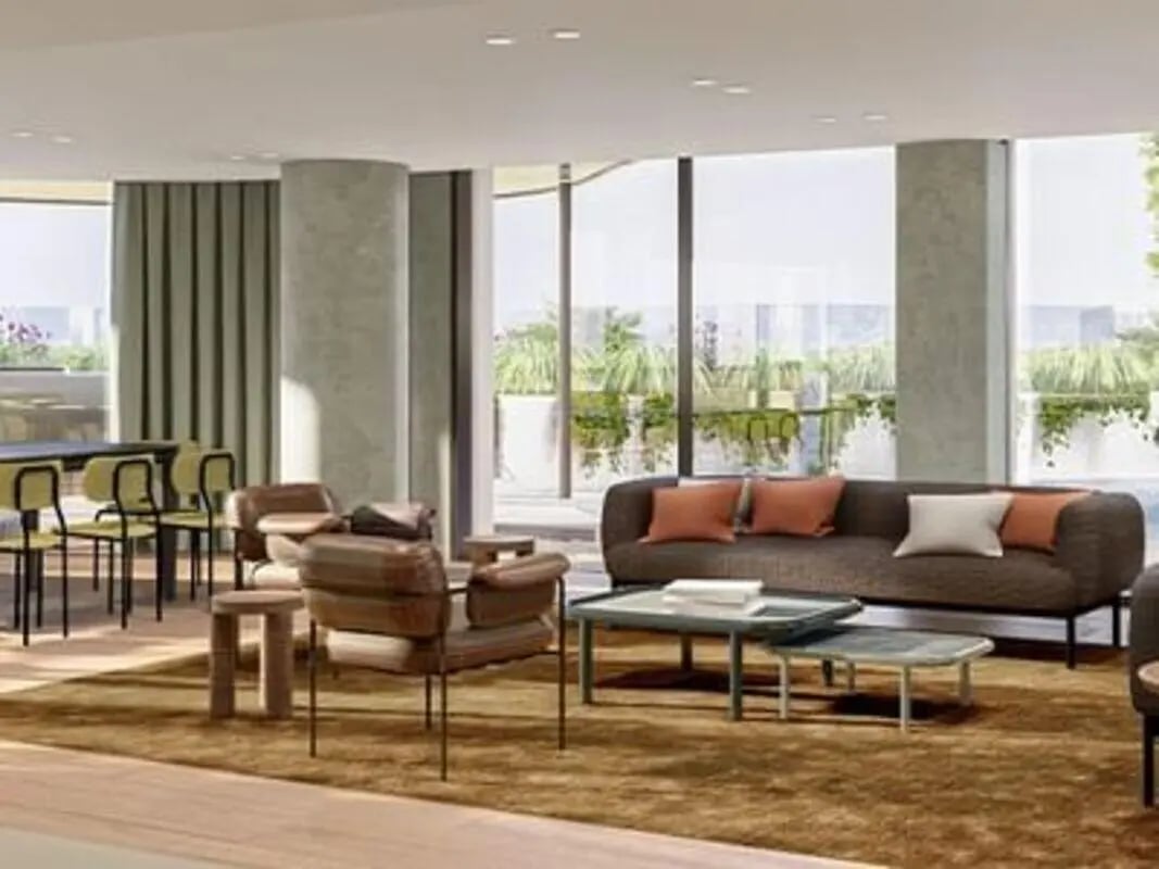 Sofa chairs tables and chairs living room at Caulfield Place in Melbourne Student Accommodation