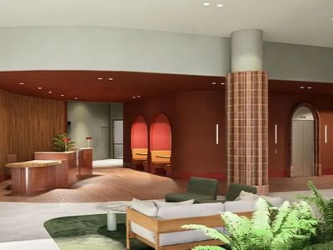 Reception desk elevator and lounge seating common area at Caulfield Place in Melbourne Student Accommodation