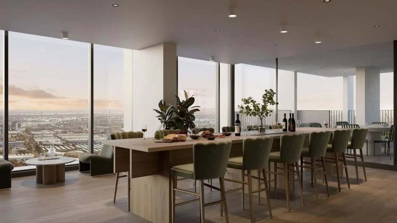 Communal dining table with bar stools and food communal area dining room at The Archive - Residential Living in Melbourne Student Accommodation