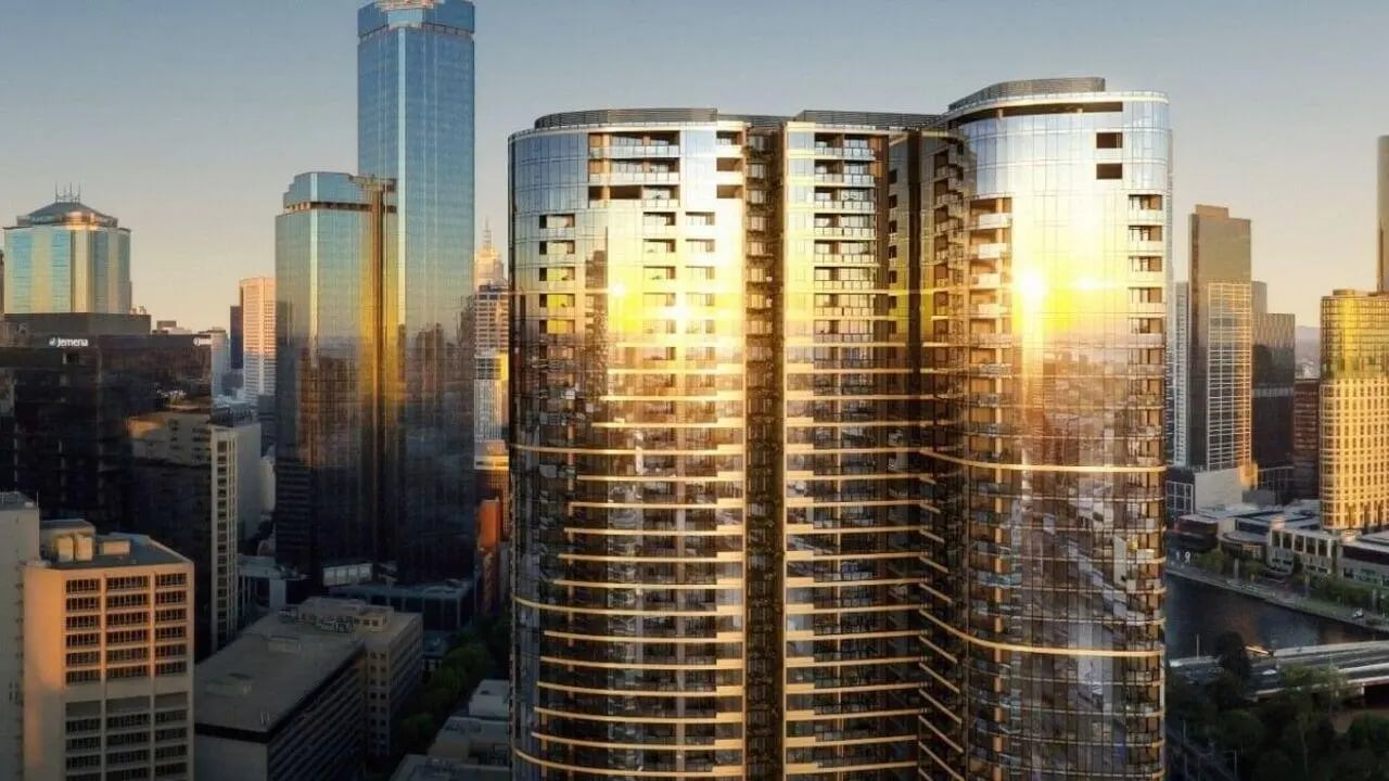 Modern curved glass skyscraper cityscape exterior at West Tower, Melbourne Quarter in Melbourne Student Accommodation