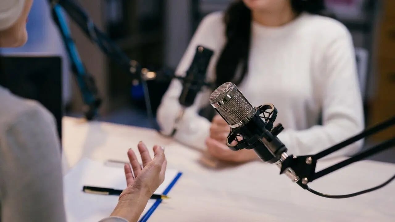 Mics and people recording podcast studio at West Tower, Melbourne Quarter in Melbourne Student Accommodation